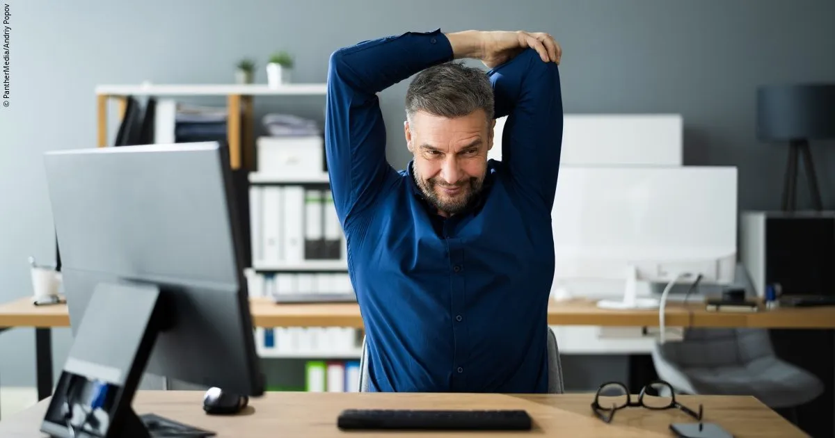 Office professional reviewing movement routine on screen